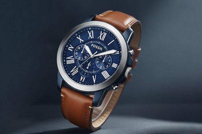 Fossil watch with leather strap.